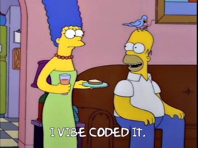 A screengrab from an episode of The Simpsons. Marge enters the living room to find Homer on the couch with a small blue bird pecking at the three hairs on his head. In the original episode, Homer replies to Marge, &ldquo;He's grooming me.&rdquo; In this altered image, the caption reads &ldquo;I vibe-coded it.&rdquo;